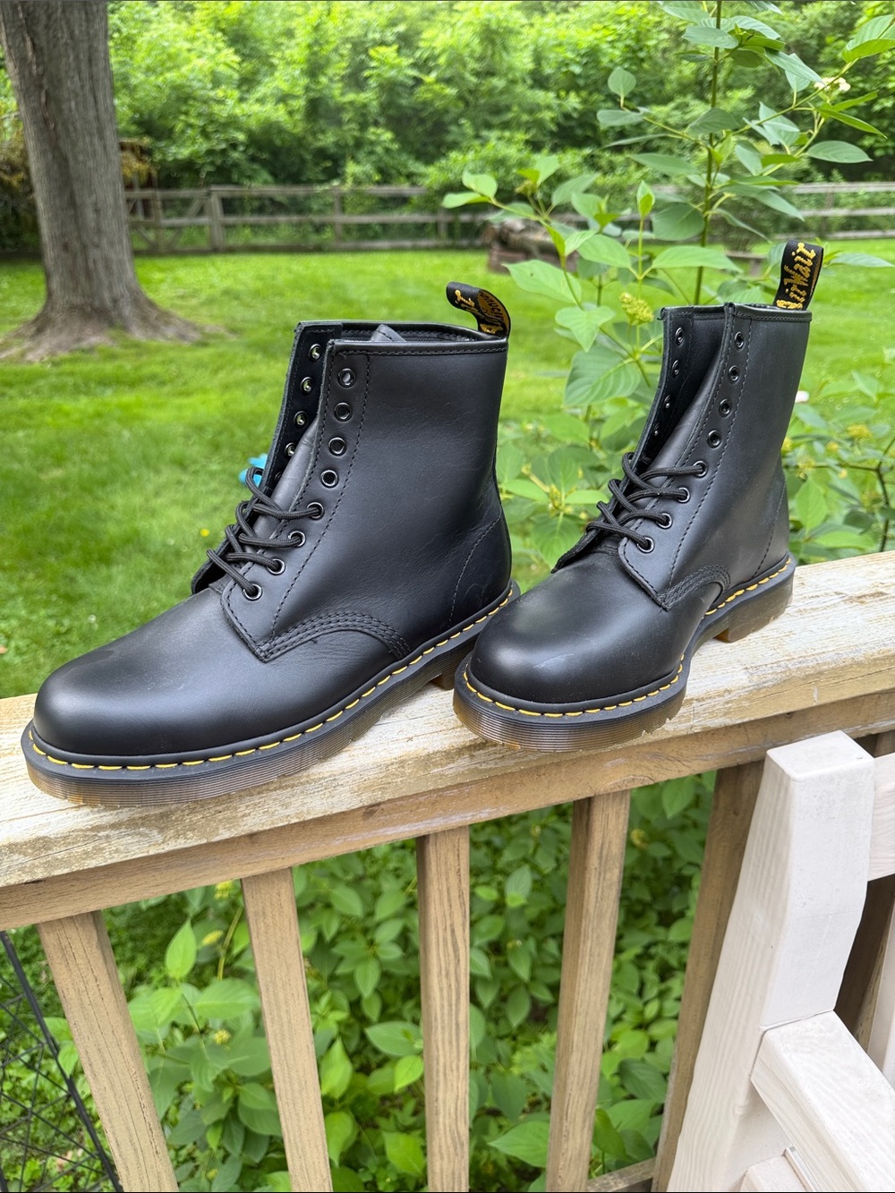 Dr. Martens Black Leather 8-Eye Lace-Up Boots with Yellow Stitching